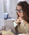 Girl at desk with computer